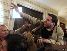 Muntadar al-Zaidi throws a shoe at George Bush (14 December 2008)